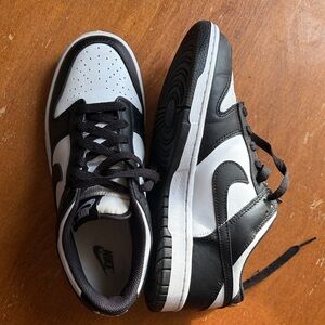 Nike youth or women’s Black and White Low-Top Sneakers